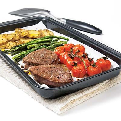 Our Recipes - Beef tournedos and veggies on a baking sheet | Marché Bonichoix